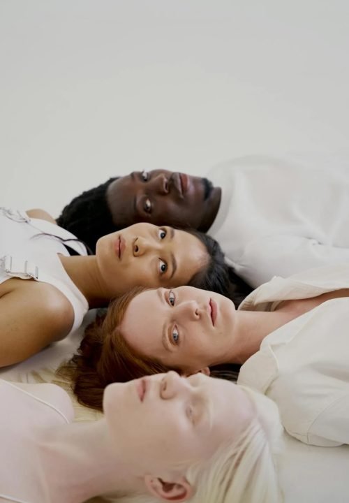 women-and-man-lying-on-white-surface-10211662 women-and-man-lying-on-white-surface-10211662
